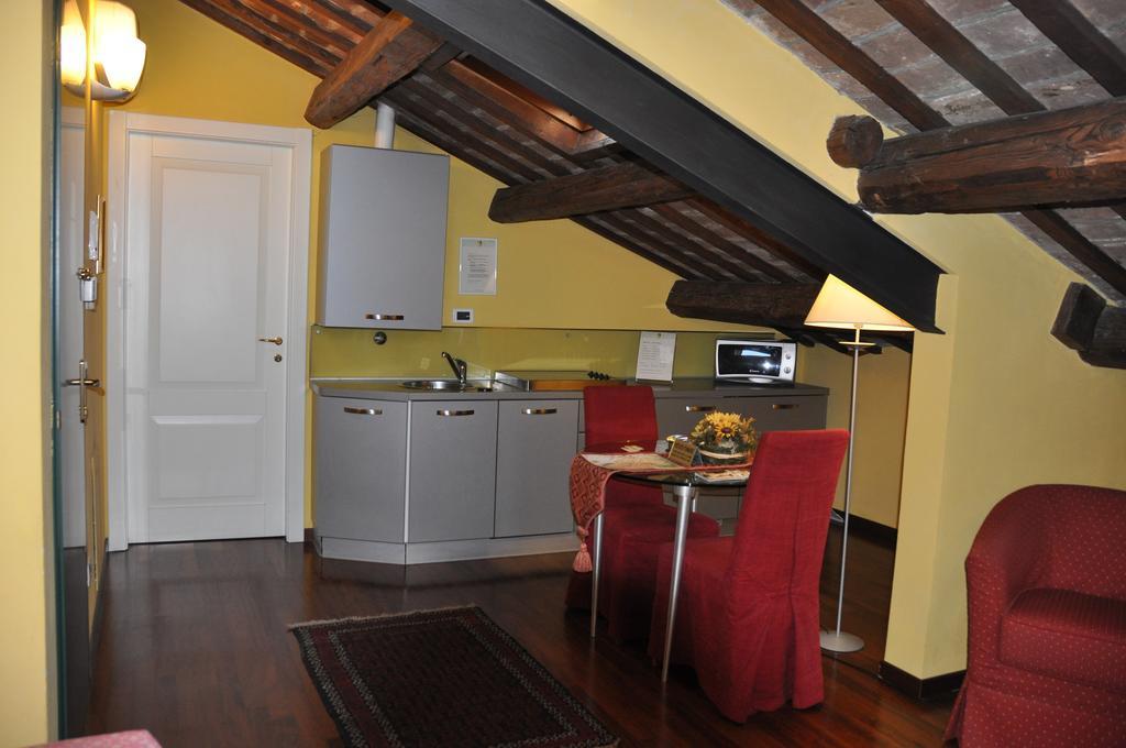 Piazza Nova Guest House Ферара Стая снимка