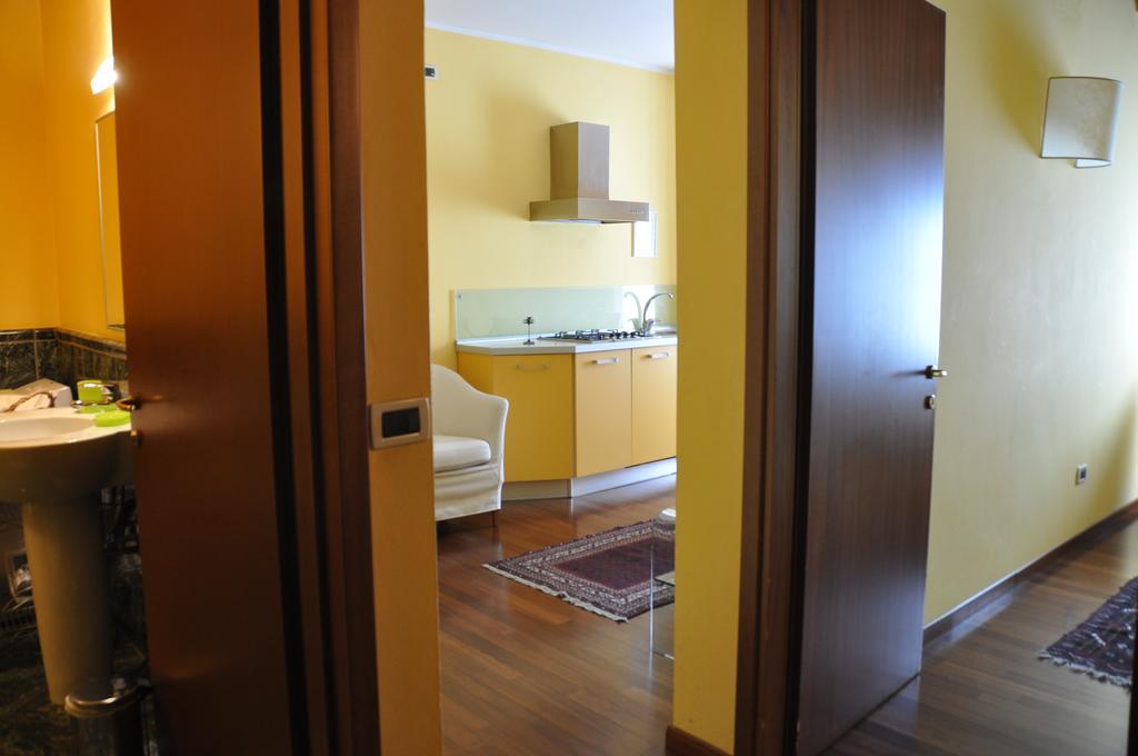 Piazza Nova Guest House Ферара Стая снимка